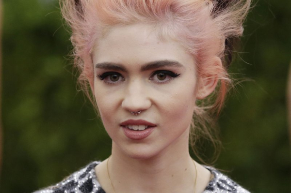 Grimes cancels Pride performance due to 'family issues'