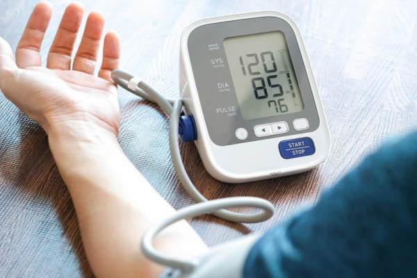 Stock photos often show incorrect blood pressure checking procedure