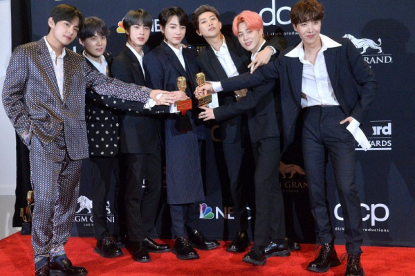 BTS to make full-group comeback with new album in March after nearly 4 years